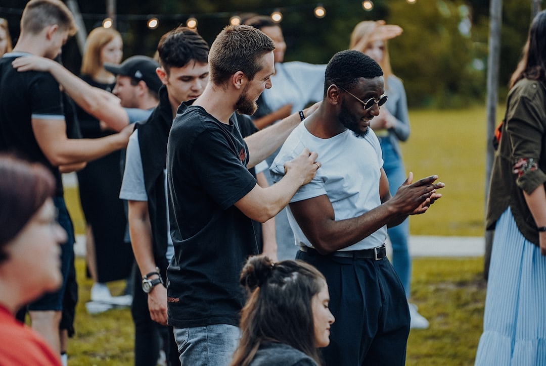 Group of people participating in a wellness workshop outdoors