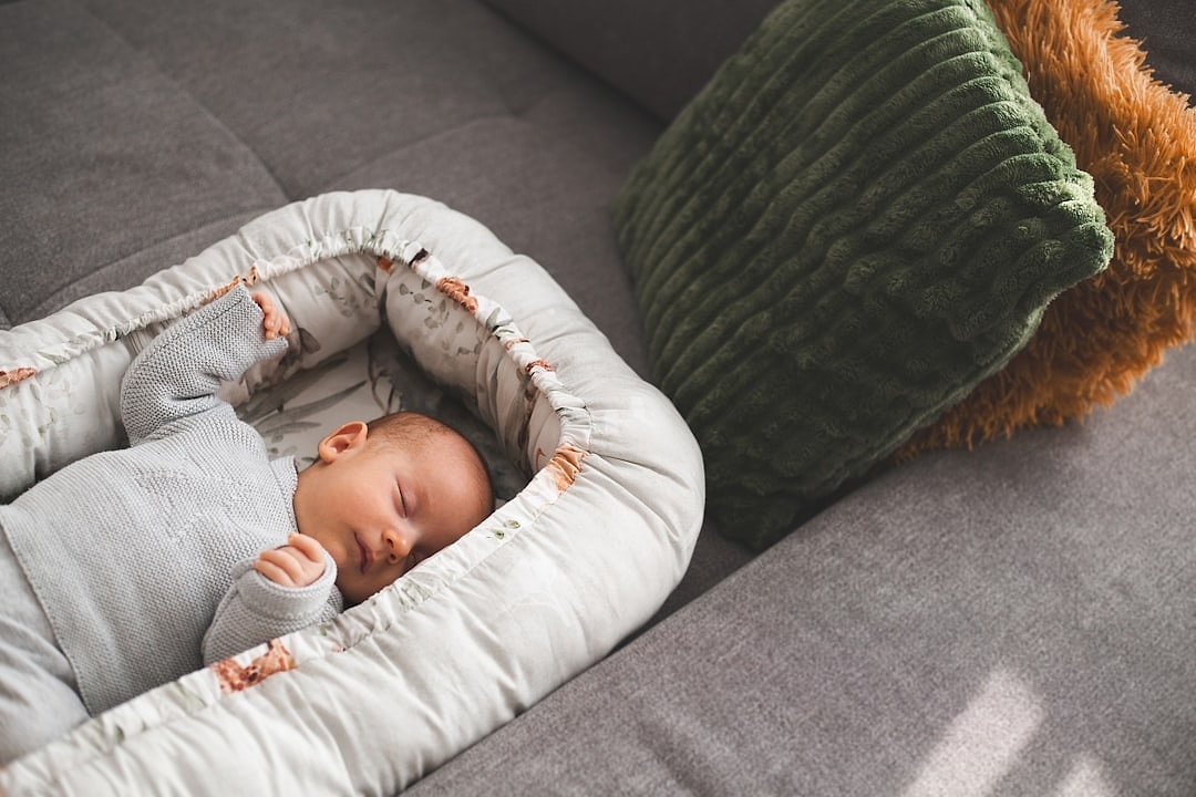 Person sleeping peacefully in a cozy bedroom